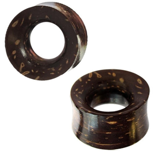 Two cylindrical, dark brown Kokosnussholz Tunnel Scheiben Holztunnel, hand-carved with light tan streaks, flared edges, and a central hole. One plug is upright, the other angled. Tribal Holz Plug Expander design.