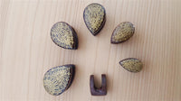 Load image into Gallery viewer, Holzplug Träne Ornament golden Tropfen umgedreht Schlitz Lobe Piercing Holz Plug
