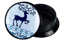 Load image into Gallery viewer, A festive Schraub Plug Acryl Rentier Weihnachten blau weiß Schneeflocken Ohrschmuck: black round plug with a blue reindeer and snowflake design on white—perfect for your lobe piercing.
