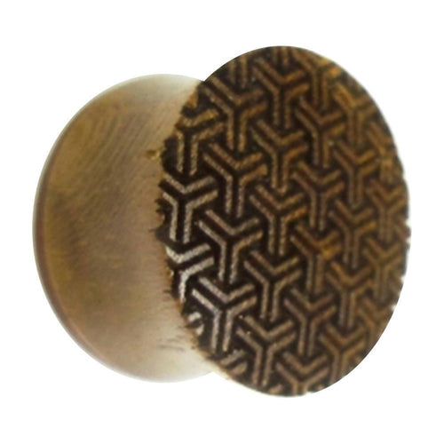 A double-flared flesh plug made from teakholz, engraved with a peace knot pattern—ideal for organic lobe piercings.