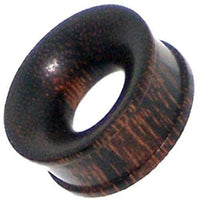 Load image into Gallery viewer, The Tamarindenholz Tunnel dunkel gemasert straight ribbed is a dark brown ear plug with a straight ribbed design and visible wood grain, ideal for fans of natural wooden flesh tunnels.
