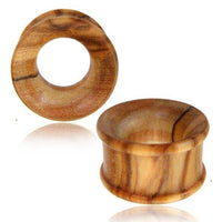 Load image into Gallery viewer, Two Olivenholz Flesh ribbed Tunnel Lobe Piercings are shown: one stands upright, the other lies on its side to reveal the hollow center. Both feature smooth, polished surfaces with natural wood grain and a straight design.

