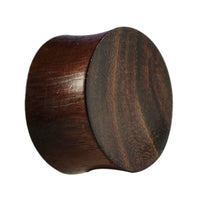 Load image into Gallery viewer, The Teakholz Holz Plug Tunnel Expander Unisex Ohrschmuck is a dark brown, cylindrical plug with slightly convex sides and visible wood grain, crafted for body piercing.

