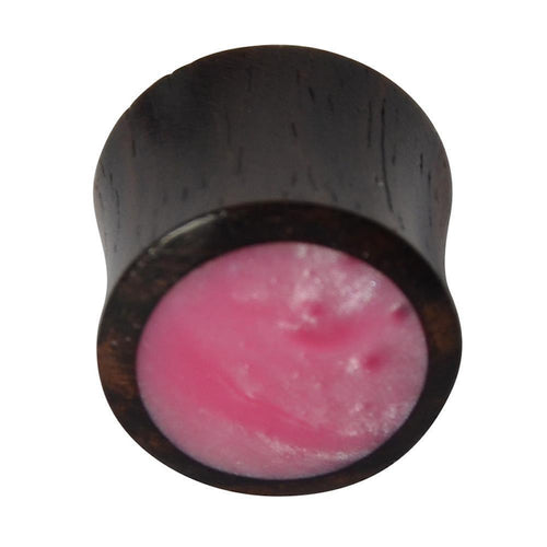 The Holz Plug Sonoholz features a dark wooden double-flared design with a smooth, slightly domed, shimmering pink resin inlay, shown against a white background.