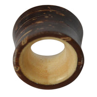Load image into Gallery viewer, The Holz Flesh Tunnel Kokosnussholz dunkel Krokodilholz hell is a cylindrical ear plug with a flared edge, featuring a dark brown exterior and light tan interior, displayed against a white background.
