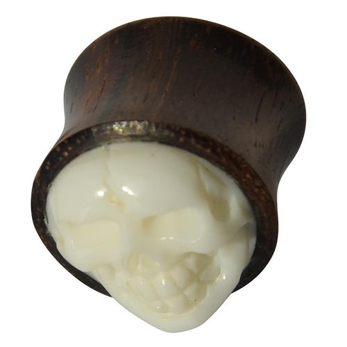 The Holz Plug Sonoholz Bone Inlay Totenschädel double flared features a wood design with a striking 3D white skull inlay—distinctive organic Ohrschmuck for those who love bold, standout style.