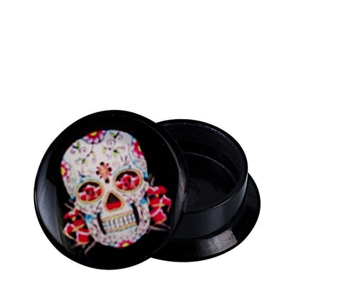 A small white-red Schraub Plug Acryl container for Piercing Ohrschmuck with its lid off. The lid displays a colorful Mexican Sugar Skull design with floral patterns and red accents. The empty container sits on a white background.