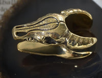 Load image into Gallery viewer, Saddle Plug Flesh Tunnel Büffel Schädel Messing gold
