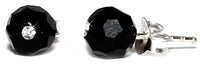 Load image into Gallery viewer, A pair of Ohrstecker Onyx schwarz facettiert mit weißem Glitzerstein aus 925er Sterling Silber, präsentiert vor weißem Hintergrund.
