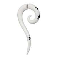 Load image into Gallery viewer, The Fake Piercing Bone Edelstahl weiß Spiralen Sterne Spike Ohrstecker Ohrring features a white spiral design with black stars and a pointed end, offering a stylish fake piercing look against a plain white background.
