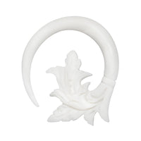 Load image into Gallery viewer, A white fake piercing ear cuff in spiral shape, crafted from bone and stainless steel, featuring star and spike details for a striking look.
