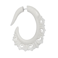 Load image into Gallery viewer, The Fake Piercing Bone Edelstahl Ohrring in white features a spiral and spike design with star accents, crafted to look tribal and ornate. This curved earring is perfect for a striking, non-permanent piercing style.
