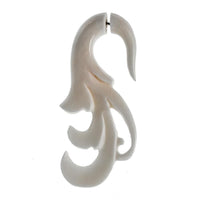 Load image into Gallery viewer, A single, intricately carved Fake Ohr Piercing Bone Knochen Edelstahl weiß Spiralen Dehner Ohrstecker Ohrring with swirling curves and pointed ends, set against a plain white background—ideal for fans of abstract or tribal-style ear jewelry.
