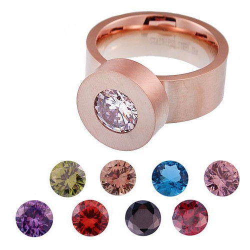 The Steinchen Glitzer Glas Kristall Wechsel Schmuck Glaskristall Damen Ring features a rose gold design with a large clear faceted center stone and eight interchangeable colorful glass crystal accents.