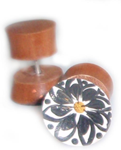 A pair of Tribal Fake Plug Holz Edelstahl Tunnel Sonoholz earrings, one shown upright with a hand-painted black and white floral design and yellow center, the other lying on its side revealing the metal post.