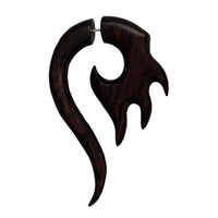 Load image into Gallery viewer, The Fake Piercing Ebenholz Edelstahl handgeschnitzt groß Ebony dunkelbraun Dehner is a dark ebony ear stretcher with a flame-like curve and metal pin, ideal for achieving a stylish fake piercing look.
