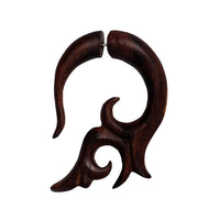 Load image into Gallery viewer, A single large fake piercing earring, hand-carved from light and dark brown Sonoholz with a wave-like spiral design, pointed ends, and a stainless steel clasp. Product: Fake Piercing Sonoholz Edelstahl handgeschnitzt groß hell dunkelbraun Dehner.
