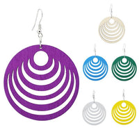 Load image into Gallery viewer, Five round, colorful Holzohrringe (50 mm) with curved cutout patterns in purple, white, blue, green, silver, and yellow are displayed on white. On the left is a large, nickelfree purple earring from the "Holzohrringe bunt 50 mm rund Halbkreise Damen Ohrringe Holz Ohrhänger Organic.
