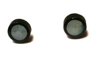 Load image into Gallery viewer, Two small, round Ohrstecker Kokosnuss weiß schwarz aus 925er Silber mit Perlmutt Muschel und Holzelementen liegen getrennt auf schlichtem weißem Hintergrund.
