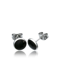 Load image into Gallery viewer, The Edelstahl Stein Holz Muschel Ohrstecker silber 8mm rund are round stud earrings with black stone centers in silver stainless steel, ideal as unisex jewelry, shown on a white background.
