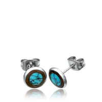 Load image into Gallery viewer, A pair of round 8mm Unisex Edelstahl Stein Holz Muschel Ohrstecker in silver, featuring blue turquoise stones with brown veins and a brown border, secured with push-back closures.
