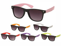 Load image into Gallery viewer, The Sonnenbrille Punkte Unisex Nerd Brille set includes 7 retro-style pairs with black frames and colorful, polka-dot arms—pink, orange, red, purple, white, green, and yellow—each offering UV 400 protection.
