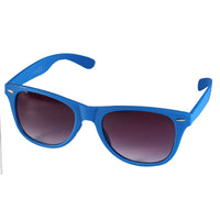 Load image into Gallery viewer, Blue-framed Sonnenbrille Nerd einfarbig Unisex Brille with dark, slightly rounded rectangular lenses and 400 UV protection is shown against a white background.
