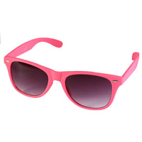Load image into Gallery viewer, The Sonnenbrille Nerd einfarbig Unisex Brille features a classic wayfarer style in pink plastic, dark gradient-tinted mirrored lenses, 400 UV protection, and silver hinge accents. Unisex design shown on a white background.
