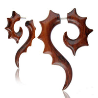 Load image into Gallery viewer, Ohrring Holz Fake Piercing lange Spirale Edelstahl Dehnschnecke: Stylish wooden earrings with glossy, swirling spiral shapes, featuring intricate designs resembling horns or flames. Includes posts for pierced ears; perfect as eye-catching fake piercings.
