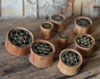 Load image into Gallery viewer, Olivenholz Horn Inlay Flesh Plug Blume des Lebens - chicnit.com

