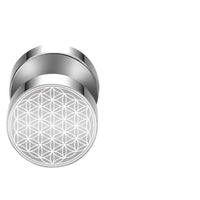Load image into Gallery viewer, A silver Fake Plug Piercing aus Edelstahl (10mm) with a Blume des Lebens Viking geometric pattern on its flat surface, displayed against a plain white background.
