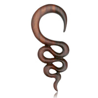Load image into Gallery viewer, The Holz Lobe Piercing Dehner dunkelbraun gewunden is a dark brown wooden ear stretcher with a spiral, wavy design—ideal for stylishly expanding your lobe piercing.

