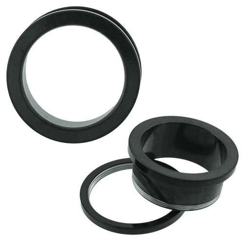 Two black circular Metalltunnel Tunnel Chirurgenstahl Unisex Edelstahl Plug Piercing pieces are shown from different angles—one upright, one flat—highlighting their hollow centers and metallic construction.